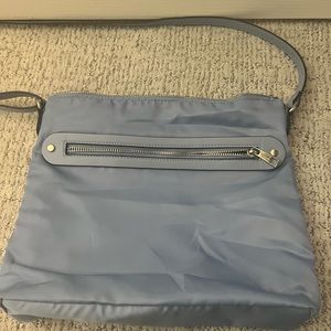 Unworn baby blue crossbody purse from target
